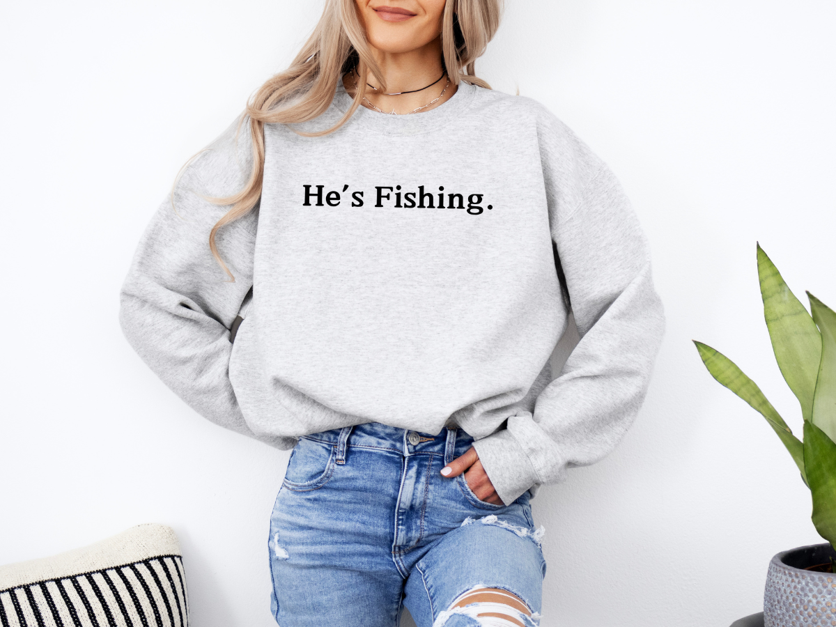 HE'S FISHING. - ADULT CREWNECK