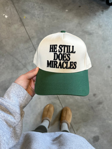 HE STILL DOES MIRACLES SNAPBACK HAT