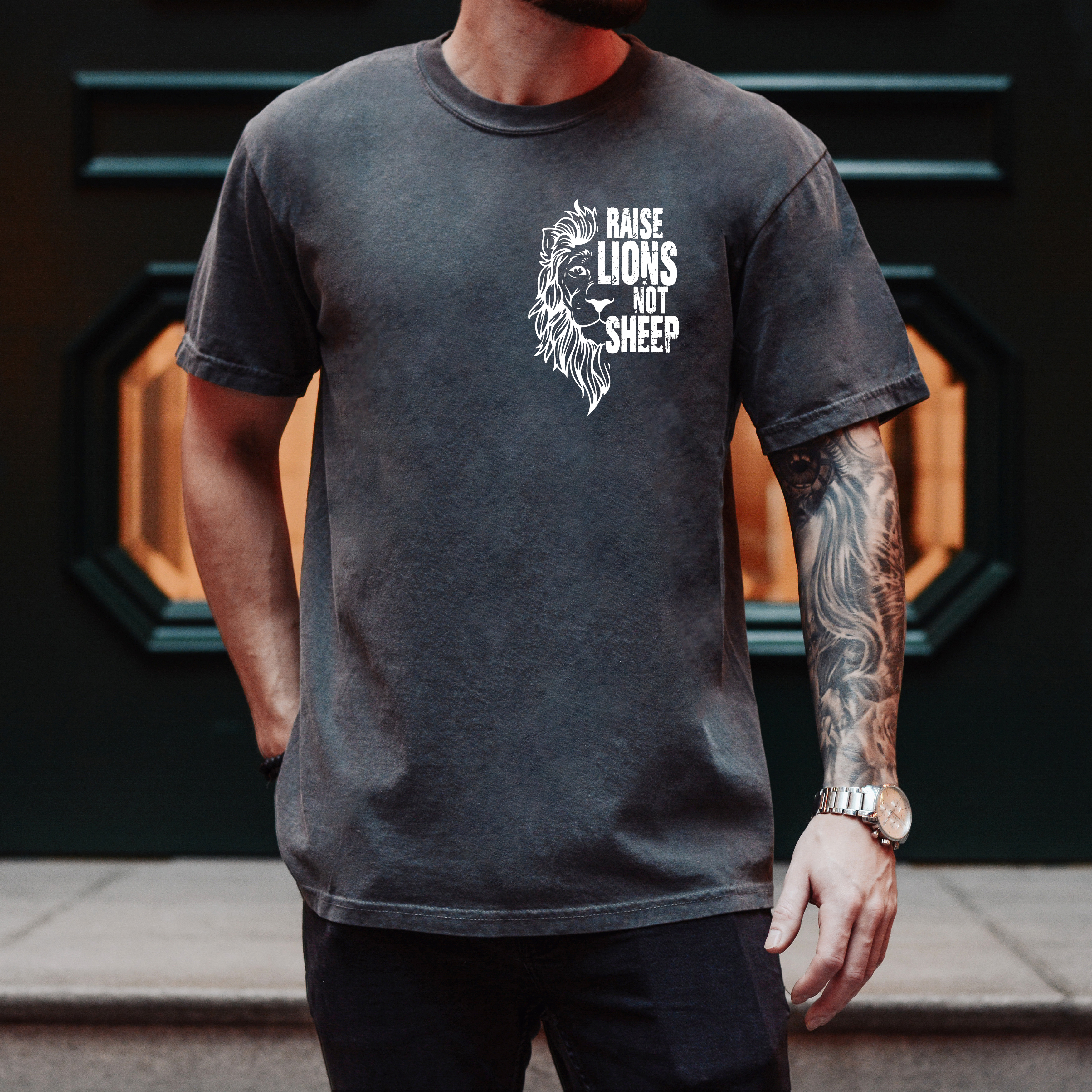 RAISE LIONS NOT SHEEP - ADULT TEE
